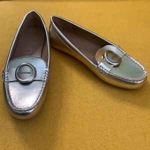 Calvin Klein gold loafers